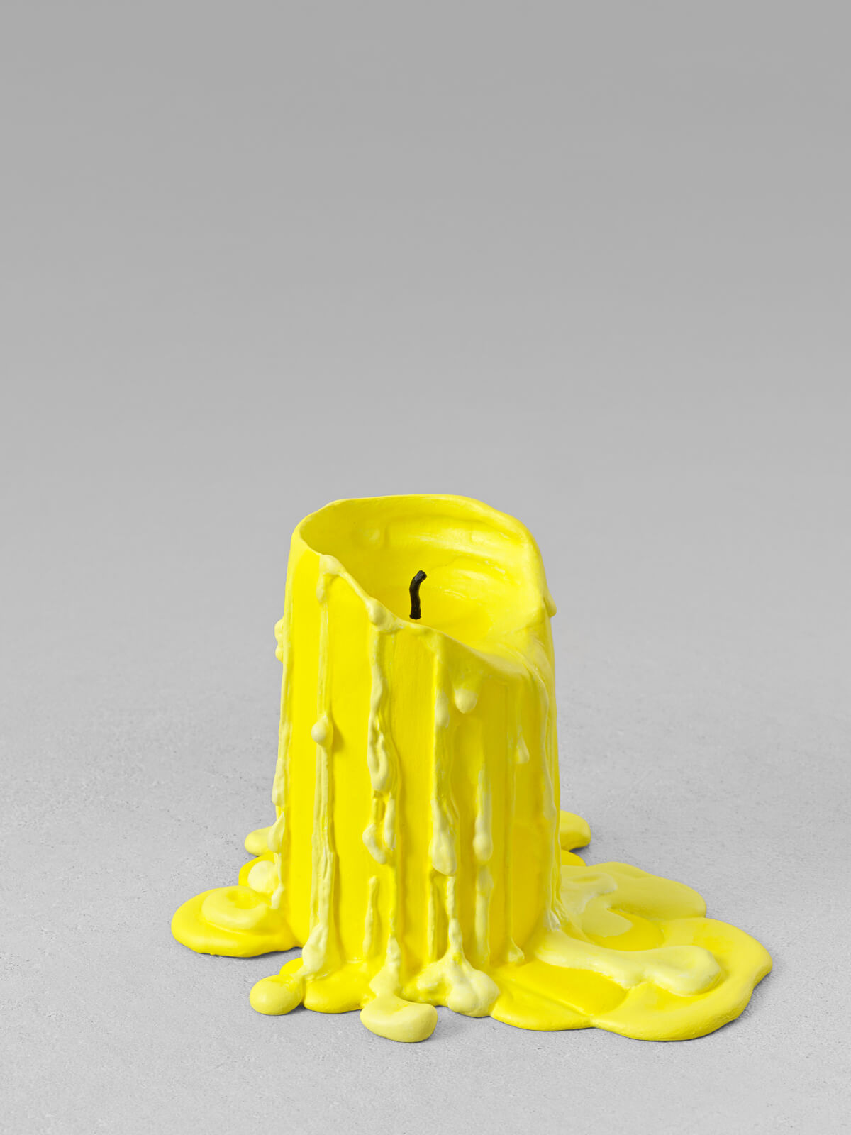 still life. (canary yellow candle) | UGO RONDINONE